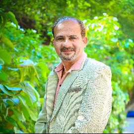 DR. VIREN B MANEK